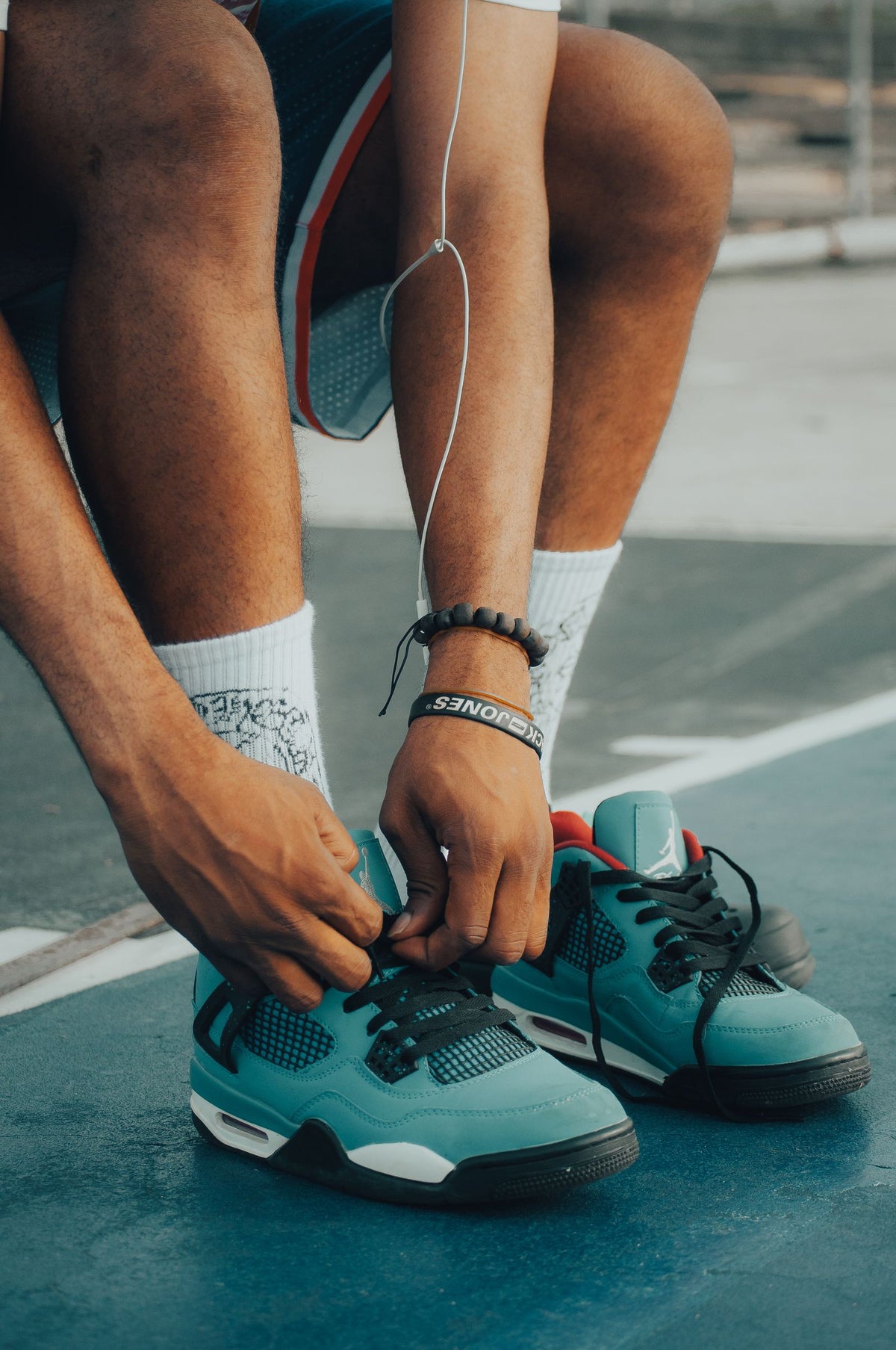 Person tying running shoes