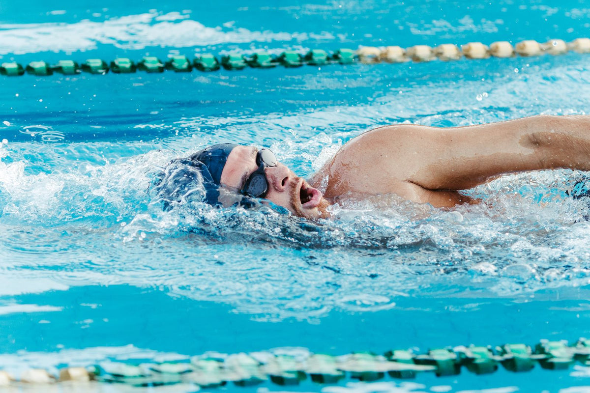 Swimmer training in an outdoor pool