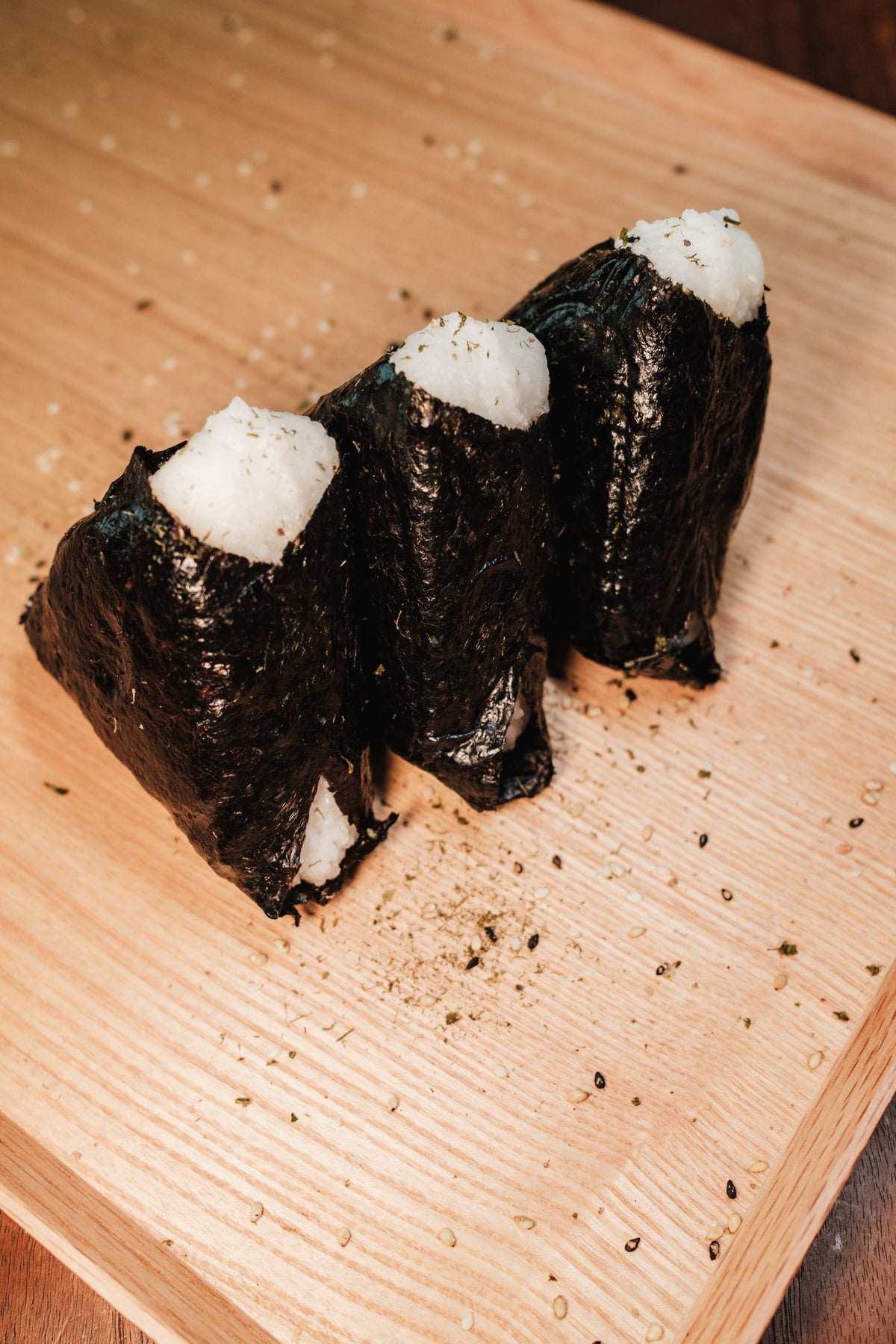 Rice balls on a wooden board