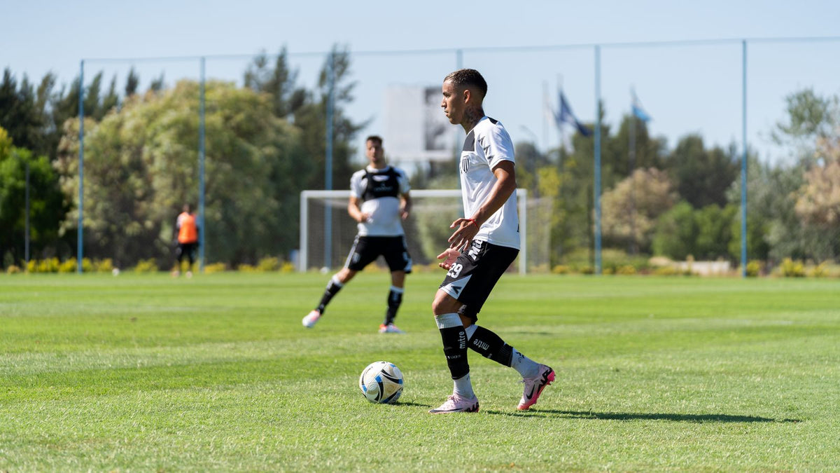 Soccer player controlling a ball during training