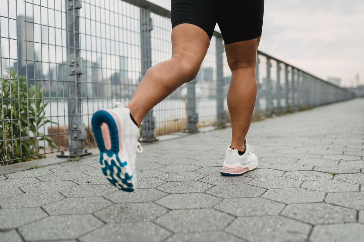 Runner's legs and shoes during an outdoor run