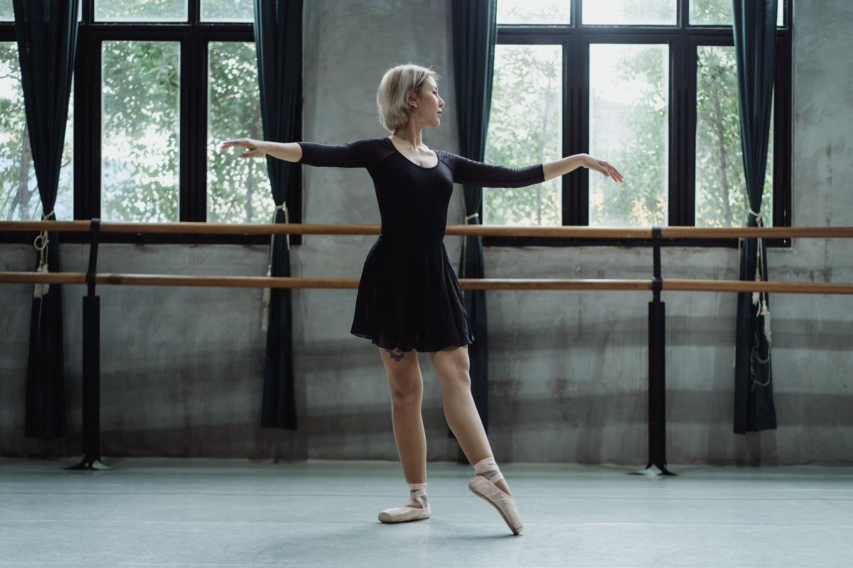 Ballet dancer practising in a light-filled studio